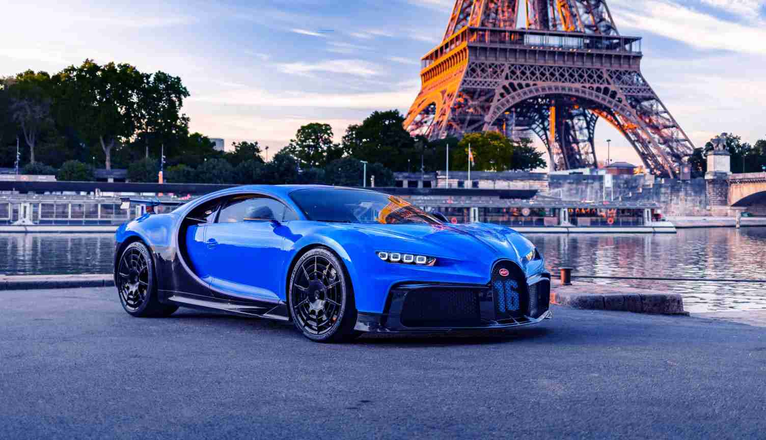 blue bugatti with eiffel tower france background wallpaper