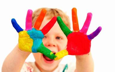 Cute child with colors in hand hd wallpaper for holi