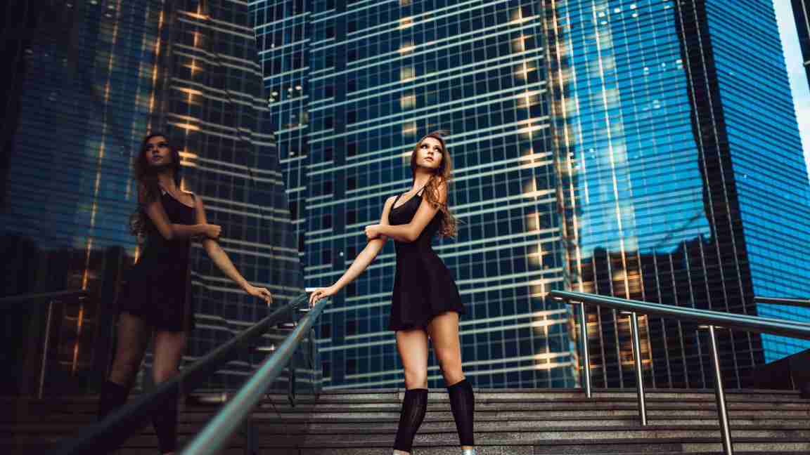 Girl photoshoot on stairs with buildings