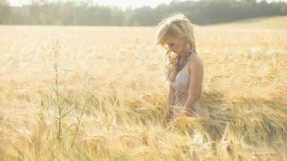 Hot girl standing on wheat farm photography