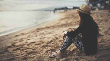 Sad girl on beach