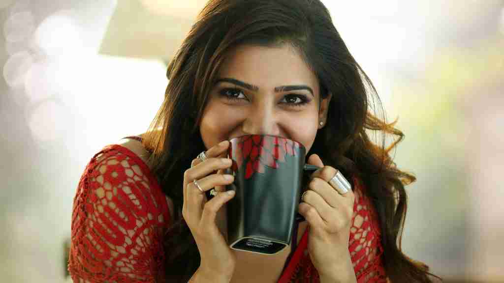Samantha with coffee cup good morning