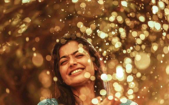 South indian actress rashmika mandanna in rain full smile hd wallpaper